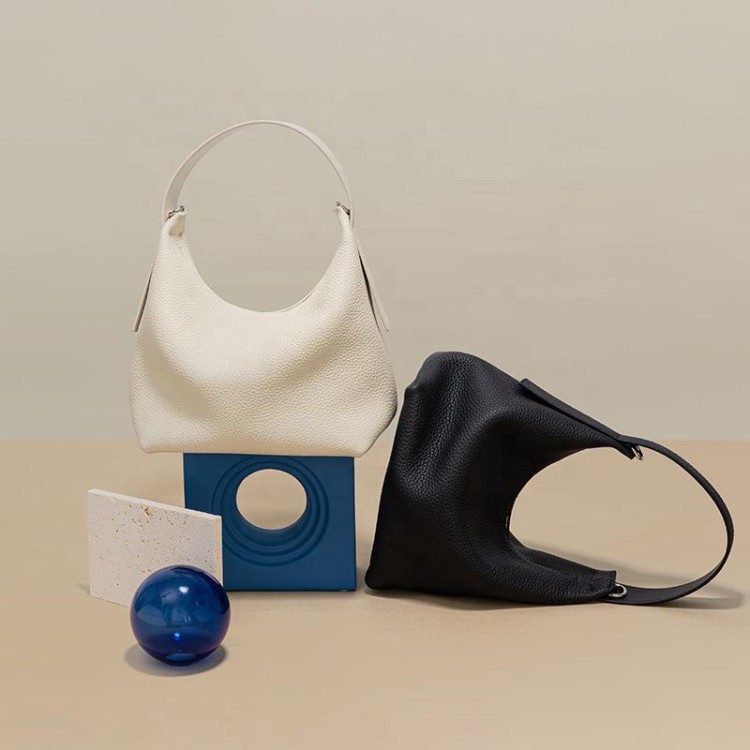 Half-moon shape soft pebbled leather handbag