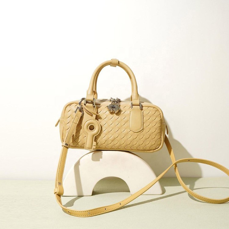 Woven leather zip lock women's handbag