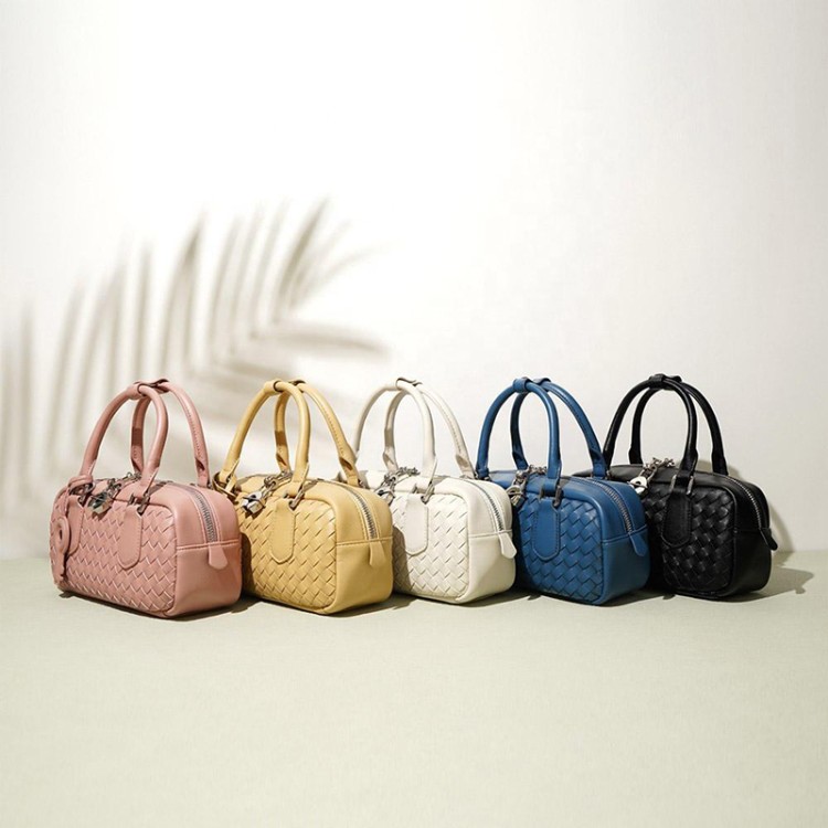 Woven leather zip lock women's handbag