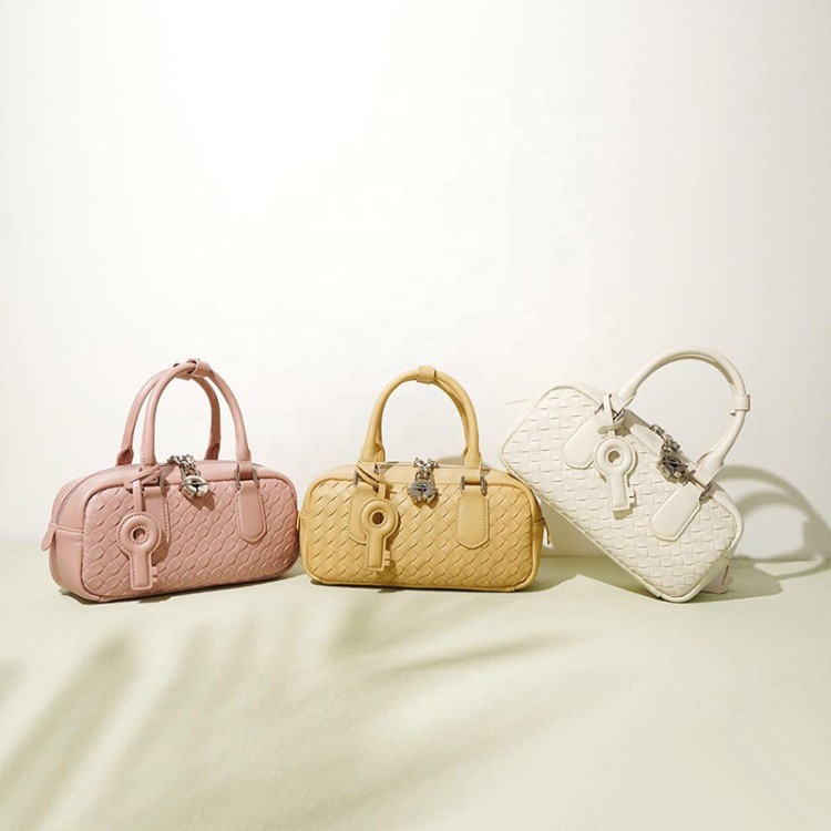 Woven leather zip lock women's handbag